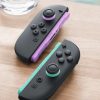 Đồ chơi điều khiển từ xa Nintendo Joy-Con 2 màu đen, Xanh lá cây sáng, màu tím Bluetooth Gamepad Analog / Số Nintendo Switch 2